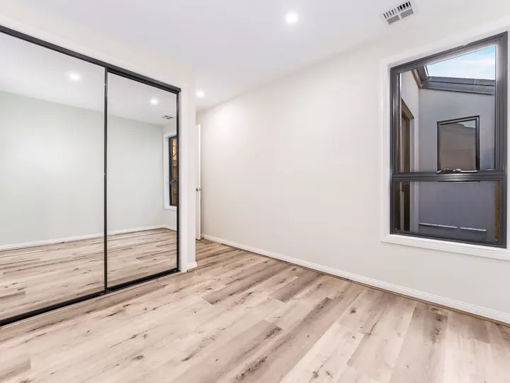 Bedroom with a mirrored robe, in the Aspen 25, built by Oakview at Oak Grove, Clyde North