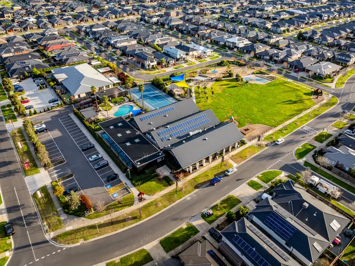 Aerial view over a new estate clubhouse in Clyde North, in a family home Oakview built in Clyde North