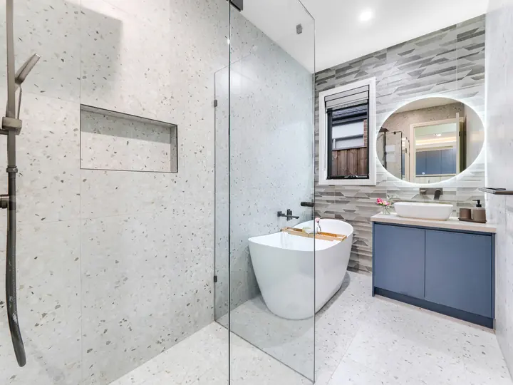 Bathroom with a freestanding bath, in a family home Oakview built in Clyde North