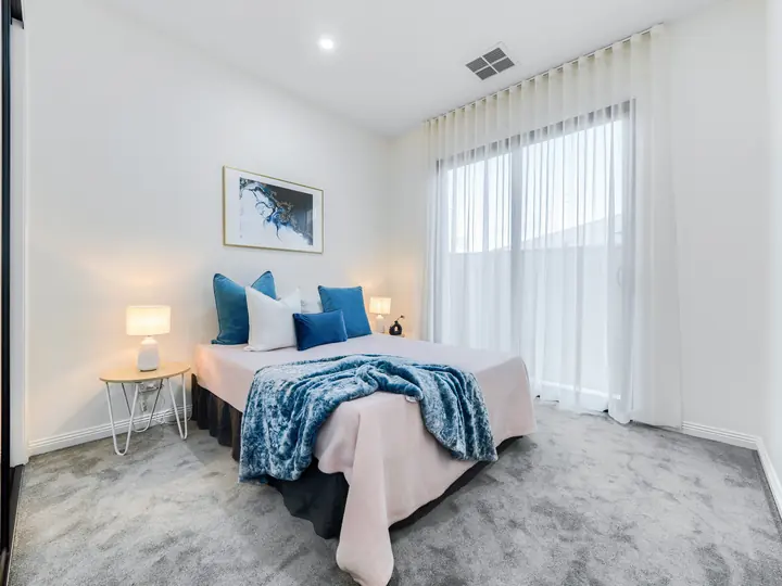 Bedroom with sheer curtains, in a family home Oakview built in Clyde North