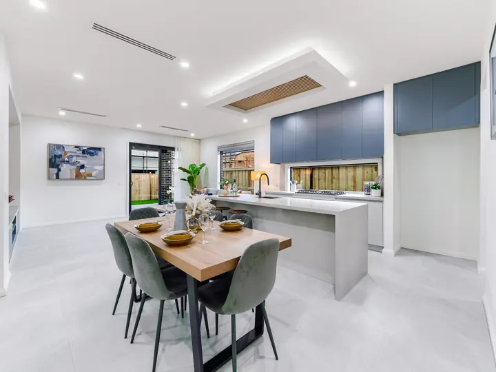 Dining area beside the kitchen, in a family home Oakview built in Clyde North