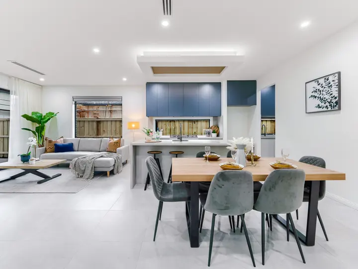 Kitchen and dining with a breakfast bar, in a family home Oakview built in Clyde North