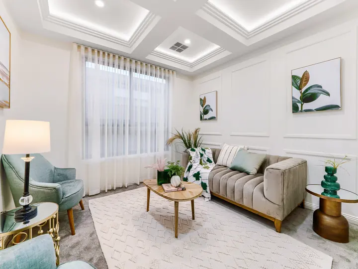 Second lounge with a coffered ceiling, in a family home Oakview built in Clyde North