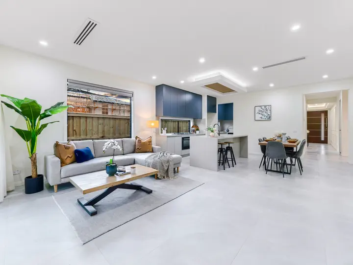 Open-plan kitchen, dining and living, in a family home Oakview built in Clyde North