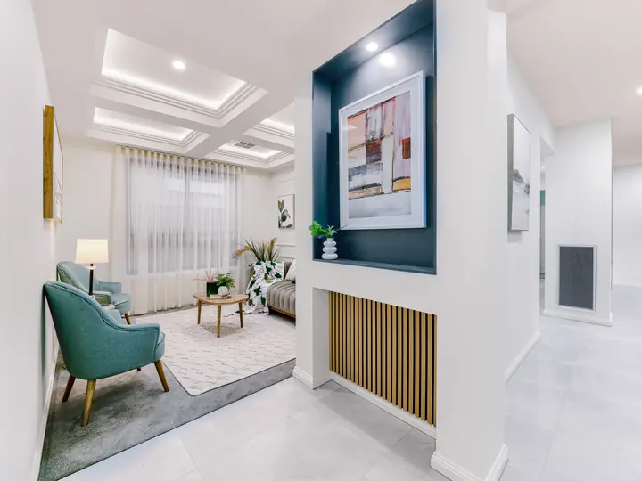 Retreat with a dark feature wall and timber battens, in a family home Oakview built in Clyde North