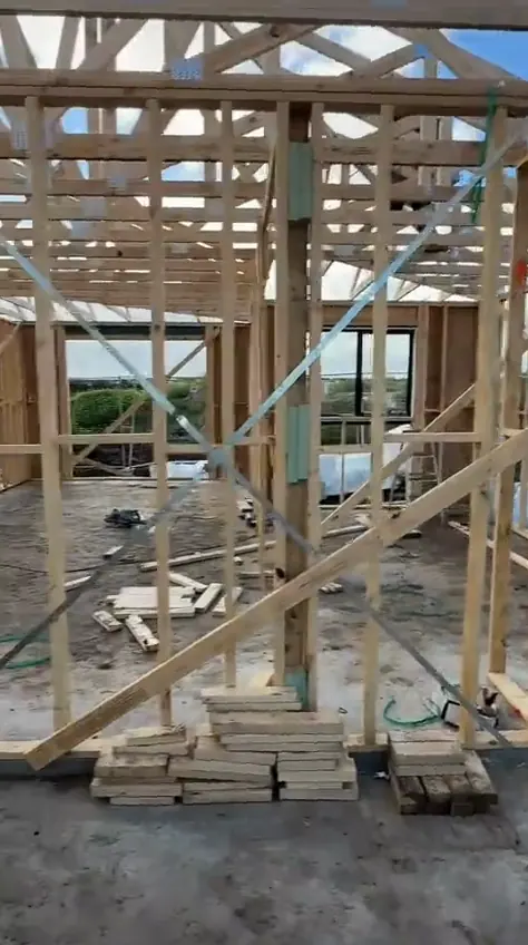 Timber wall frames and roof trusses on the slab, at an Oakview home at frame stage