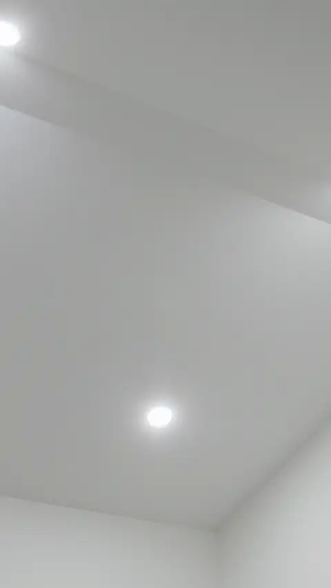 Moving view up into the raked ceiling of a single-storey home built by Oakview Homes in Clyde North