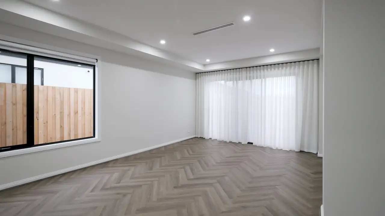 Walkthrough of a living room in a Clyde North home built by Oakview Homes