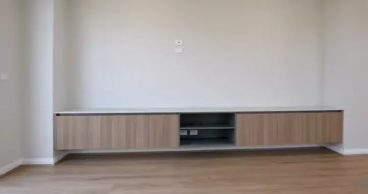 Floating TV cabinet in the living room, in the Sienna 23 by Oakview Homes